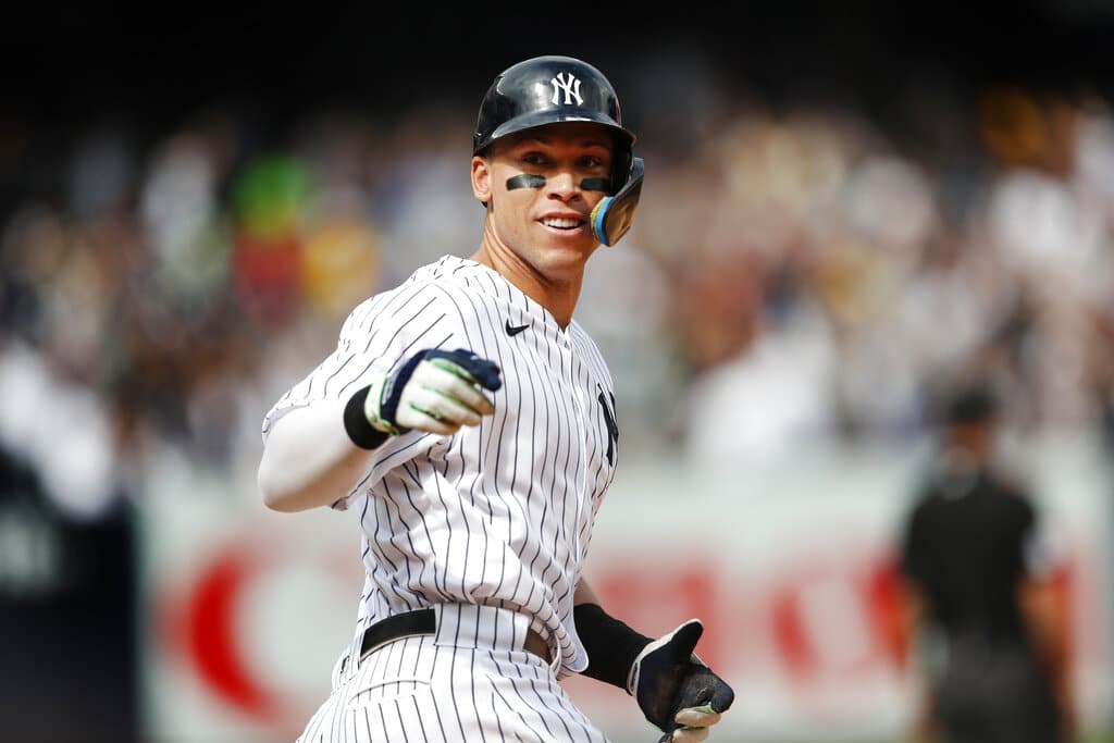 Media by Associated Press - New York Yankees right fielder Aaron Judge (99) reacts rounding the bases after hitting a home run against the Minnesota Twins during the sixth inning of a baseball game Monday, Sept. 5, 2022, in New York. (AP Photo/Noah K. Murray)